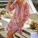 Robe de plage pour femmes manches 3/4 col en V boutons avant franges imprimé Floral style