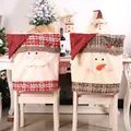 Couvertures arrière de chaise de chapeau rouge de Père Noël doublure de table d'attente de Noël