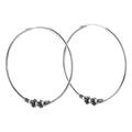 Classic Loop,'Sterling Silver Hoop Earrings with Traditional Details'