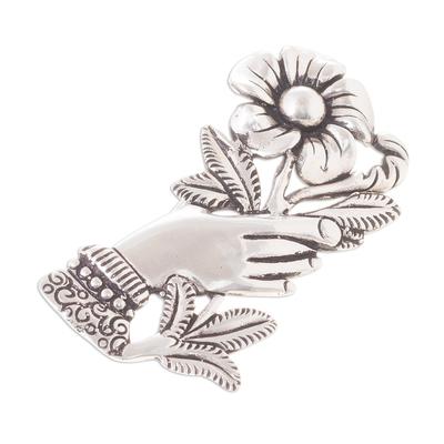Natural Universe,'Peruvian Silver Brooch of a Hand Clutching a Flower'