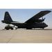 Cargo is loaded onto a C-130 Hercules here May 10. The 777th Expeditionary Airlift Squadron personn - Laminated Poster Print - 20 Inch by 30 Inch with Bright Colors and Vivid Imagery