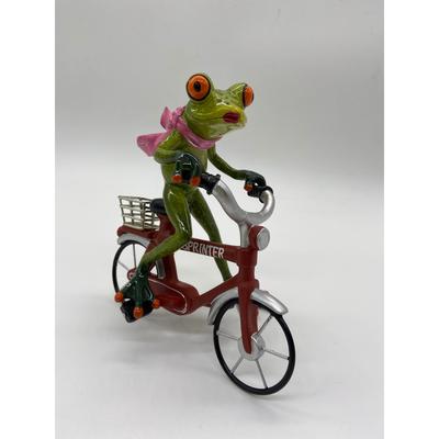 Girl Frog on Red Bike