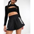 adidas Originals Metamoto jersey shorts in black