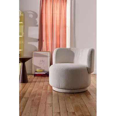 Amaia Swivel Chair - Cream L: 86.5cm x W: 83cm x H: 75cm at Urban Outfitters