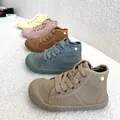 Scarpe Casual per bambini Unisex 2023 Classic High Top Girls scarpe di tela Sneakers stringate per