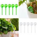 5pcs alimentatore automatico di acqua per piante auto irrigazione palla di plastica fiori esterni per interni lattine d'acqua vaso da fiori dispositivo di irrigazione a goccia