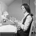 Young Woman Working in Office Poster Print - 18 x 24 in.