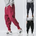 Herren schwarz rote Hosen Hip Hop Streetwear Mode Jogger Harems hose Mann lässig Jogging hose