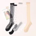 Dong Ai Damen atmungsaktive dünne kniehohe Röhren socke Nylon elastischen Punkt transparent