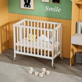 Harriet Bee Jadarius Foldable Baby Bassinet Portable Crib Wood in Brown | 35 H x 19 W x 36 D in | Wayfair 7FC71AB029374D908FBF76AD43809F2E