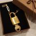 Louis Vuitton Jewelry | Authentic Louis Vuitton Vintage Lock And Key On A Gold Plated Chain Neck | Color: Gold | Size: Os