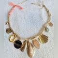 Anthropologie Jewelry | Anthropologie Silk Wrap Charm Necklace In Gold. Nwt | Color: Gold | Size: Os
