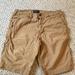 American Eagle Outfitters Shorts | American Eagle Next Level Flex 33 Inch Waist Longer Length Khakis Shorts | Color: Tan | Size: 33