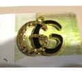 Gucci Jewelry | Gucci Running "G's" Zipper Pull | Color: Black/Gold | Size: Os