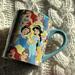 Disney Dining | Disney Princess Mug Blue Collector With Disney Trademark Belle Snow White Rose | Color: Blue/White | Size: Os