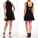 Free People Dresses | Free People Solid Black Ponte Knit Layla Fit & Flare Cut-Out Back Mini Dress | Color: Black | Size: Xs