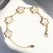 Free People Jewelry | Flower Gold Bracelet | Color: Gold/White | Size: Os