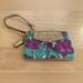 Coach Bags | Coach Small Wristlet In Floral Fabric With Gold Leather Trim And Gold Accents | Color: Green/Purple | Size: Os