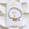 Disney Jewelry | Disney's Minnie Mouse Tri-Tone Love Is Bowtiful Stretch Charm Bracelet | Color: Gold/Silver | Size: Os