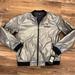 Under Armour Jackets & Coats | Mens Nwt Under Armour Project Rock Disrupt Big Logo Bomber Jacket Sz L Silver | Color: Gray | Size: L