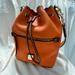 Dooney & Bourke Bags | Dooney & Bourke Pebble Grain Drawstring Shoulder Bag (Clementine Retail $388) | Color: Brown/Orange | Size: Os