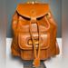 Gucci Bags | Gucci 90’s Caramel Brown Leather Drawstring Backpack With Bamboo Top Handle | Color: Brown/Gold | Size: Os