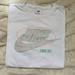 Nike Tops | Nike Champions Of Sport Unisex T-Shirt | Color: Pink/White | Size: L
