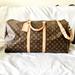 Louis Vuitton Bags | Louis Vuitton Keepall Bandoulire 55 Unisex Travel Bag | Color: Brown/Tan | Size: 55