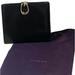 Gucci Bags | Euc Authentic Gucci Black Bi-Fold Wallet. Gold Signature Clasp Dust Bag Included | Color: Black | Size: Os