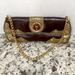 Michael Kors Bags | Michael Kors Women’s Clutch Brown & Gold Accents Gold Chain Strap | Color: Brown/Gold | Size: Os