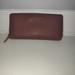 Michael Kors Bags | Authentic Michael Kors Zipper Wallet | Color: Brown/Orange | Size: Os