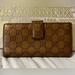 Gucci Bags | Gucci Long Wallet - Metallic Gold Brown Color - Gg Imprint | Color: Brown/Gold | Size: Os