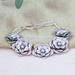 Divine Blossoming,'High-Polished Floral Sterling Silver Link Bracelet'