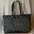 Coach Bags | Coach Black Signature Nylon Weekender Tote W/ Attached Accessory Bag Preloved | Color: Black | Size: Os