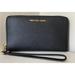 Michael Kors Bags | New Michael Kors Jet Set Travel Zip Around Phone Holder Wallet Black With Gold | Color: Black | Size: Os