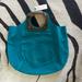 Anthropologie Bags | New! Anthropologie Turquoise Suede Bag With Lucite Handle | Color: Blue/Brown | Size: Os