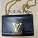 Louis Vuitton Bags | Louis Vuitton Clutch Gold/ Black Leather Gold Chain | Color: Black/Gold | Size: Os