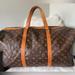 Louis Vuitton Bags | Louis Vuitton Monogram Keepall Sac Souple 55 Duffle Travel Bag | Color: Brown/Gold | Size: Os