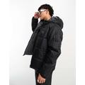 adidas Originals 3 stripe reversible puffer jacket in black and grey