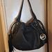 Michael Kors Bags | Michael Kors Black Pebble Leather Hobo Tassels Shoulder Bag Excellent Cond. | Color: Black/Gold | Size: 12"W X 10"H X 4