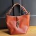 Dooney & Bourke Bags | Dooney And Bourke Brown Pebble Leather Lily Bucket Shoulder Bag Nwot | Color: Brown | Size: Os