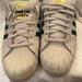 Adidas Shoes | Adidas From The Courts Superstars Men’s Size 12 1/2 Fashion Sneakers. | Color: White | Size: 12.5