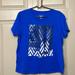 Converse Tops | Great User Condition Converse Classic Fit Women’s Size Xl Blue Shirt With Design | Color: Black/Blue | Size: Xl