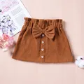 Mini jupe trapèze pour filles demi-robe mignonne nœud papillon jupe unie pour enfants vêtements