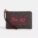 Coach Bags | Coach Corner Zip Wristlet In Signature Canvas With Horse And Sleigh Im/Brown/Nwt | Color: Brown | Size: Os