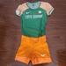 Nike Shorts | Nike Womens Cote D'ivoire Short Sleeve Romper Green 911727-Xxx Size Xs Brand New | Color: Green/Orange | Size: Xs