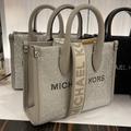 Michael Kors Bags | Michael Kors Mk Mirella Extra-Small Logo Xs Shopper Xbody Leather Crossbody Bag | Color: Gold | Size: Xsmall