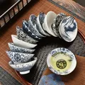 Tasse à thé en porcelaine bleue et blanche 70ml faite à la main dragon phénix pavillon des