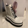 Jessica Simpson Shoes | Jessica Simpson Ladies Imelda Platform Side Zip Combat Boot Size 9.5 | Color: Black/White | Size: 9.5