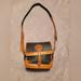 Dooney & Bourke Bags | Dooney & Bourke All Weather Leather Buckle Flap Crossbody Handbag | Color: Black | Size: Os